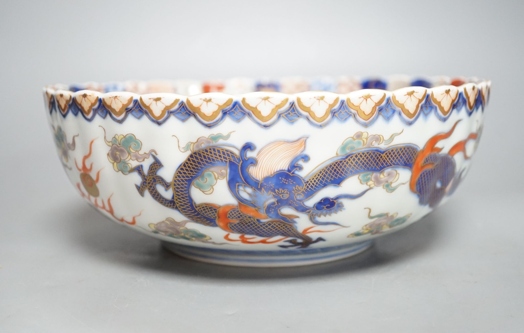A Japanese Imari petal lobed bowl, by Fukugawa, 25 cms diameter.